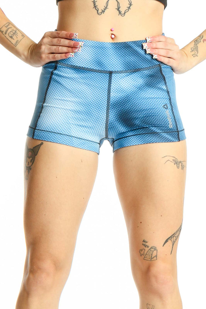 Front view of blue textured Reebok high-waist athletic shorts