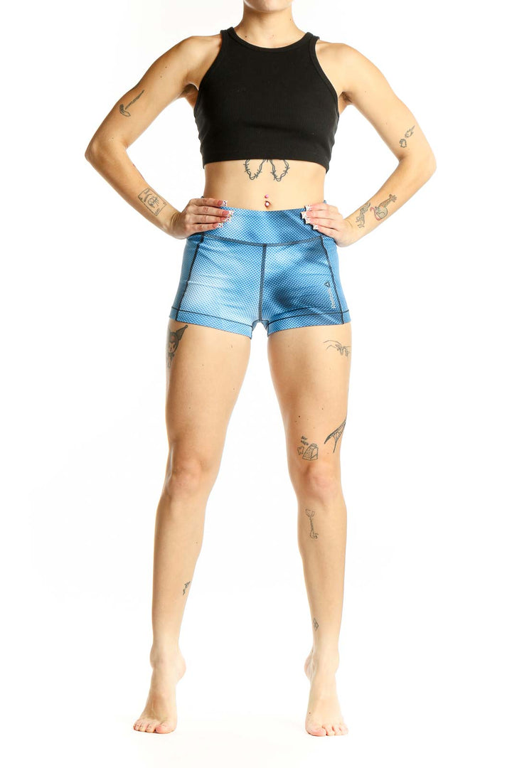 Front view of blue textured Reebok high-waist athletic shorts