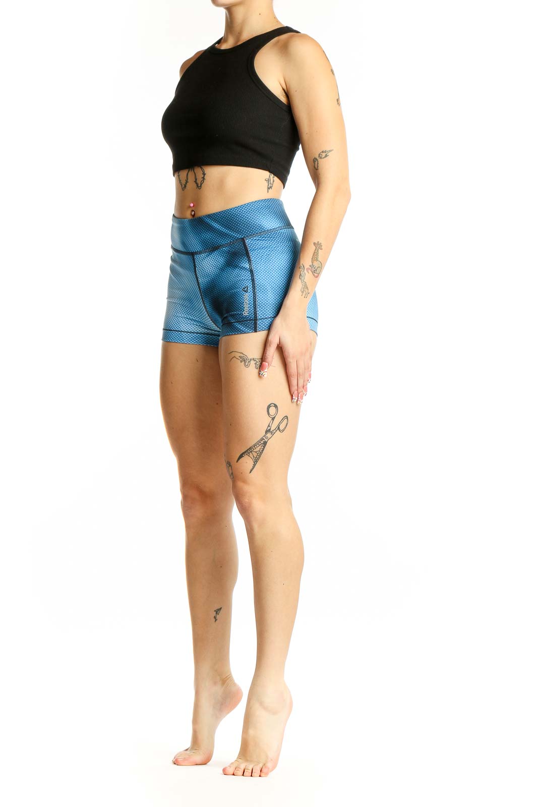 Front view of blue textured Reebok high-waist athletic shorts