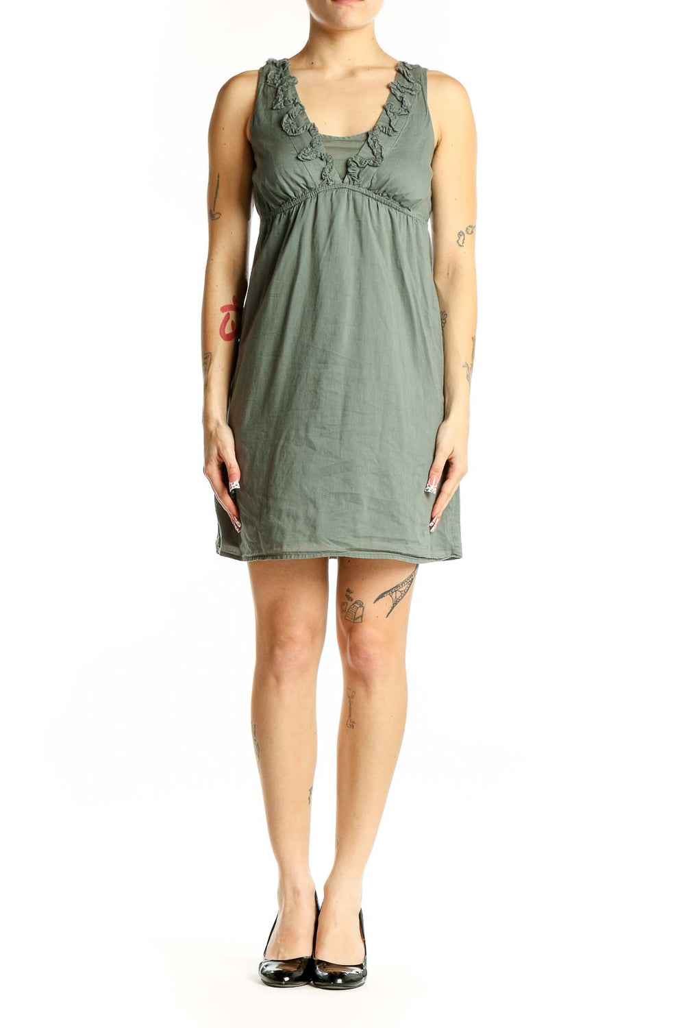 Front view of Ann Taylor LOFT sage green cotton dress with empire waist and ruffle neckline