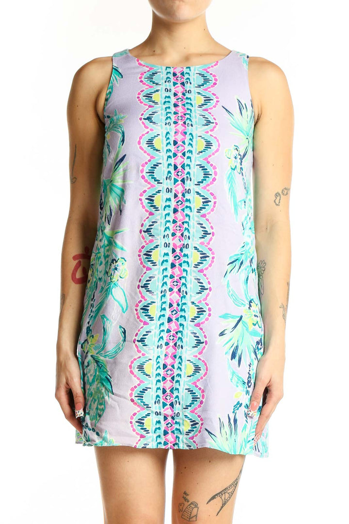 Front view of Lilly Pulitzer lavender mini dress with tropical floral print and geometric center panel