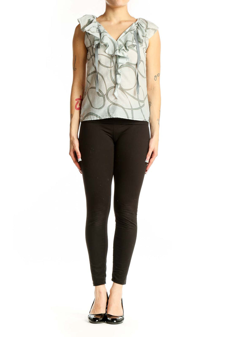 Front view of Ann Taylor LOFT light gray sleeveless blouse with ruffled V-neck and swirl pattern