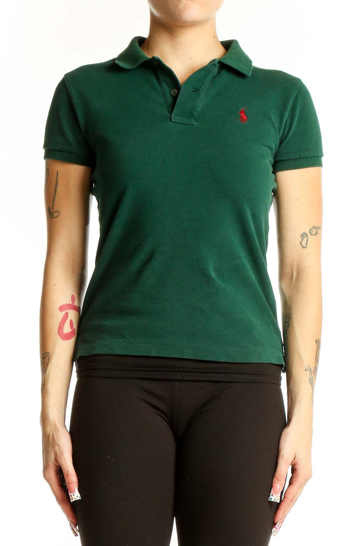 Front view of green Ralph Lauren cotton polo shirt with red pony logo