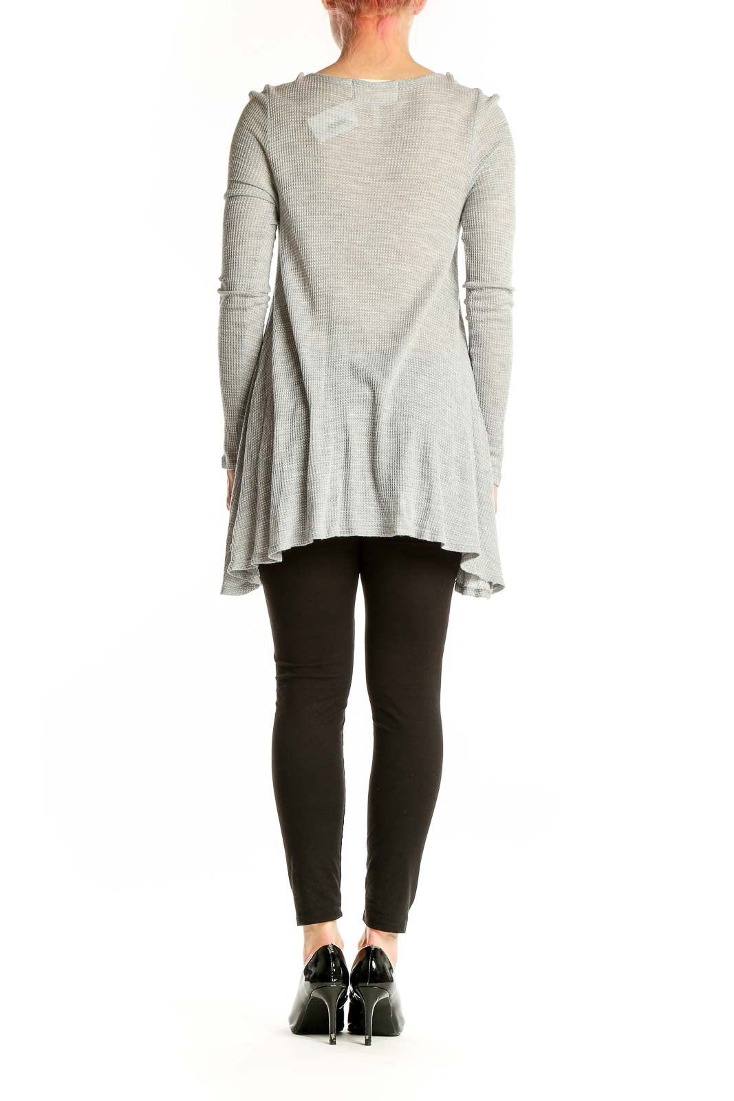 Side view of gray Puella tunic top showing flowy silhouette and long length