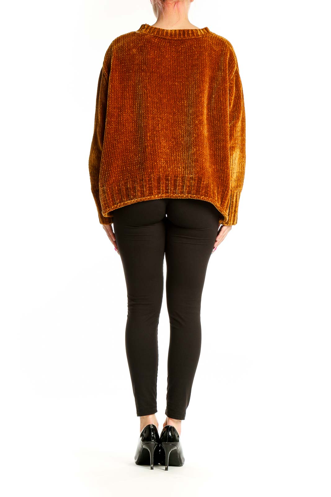 Side view of Max Studio rust ribbed velvet oversized sweater on model