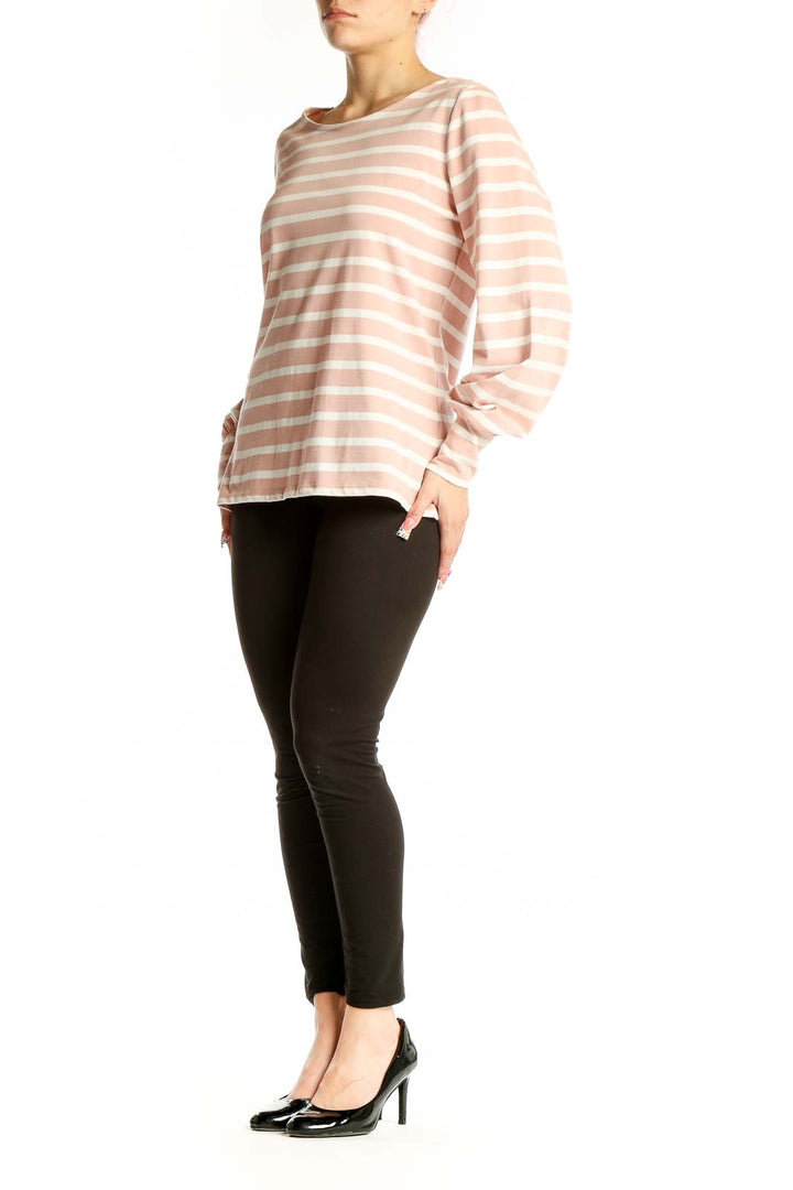 Front view of Boden pink and white striped long-sleeve cotton top