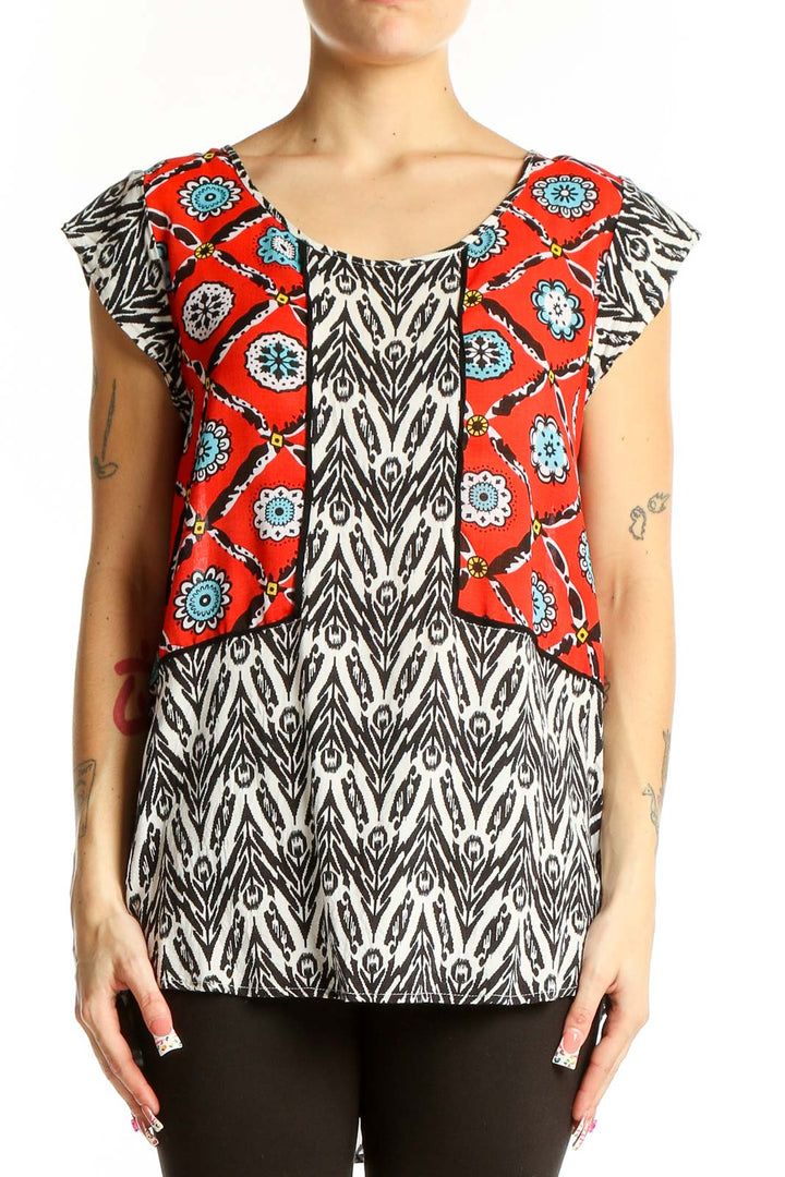 Front view of THML red and black patterned rayon top with floral design