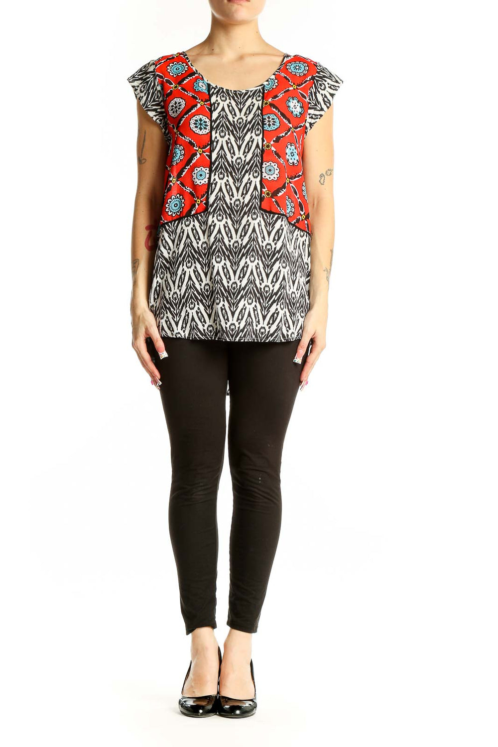 Front view of THML red and black patterned rayon top with floral design