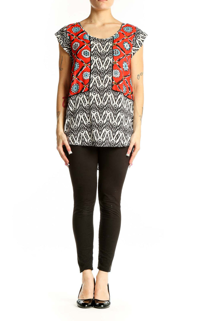Front view of THML red and black patterned rayon top with floral design