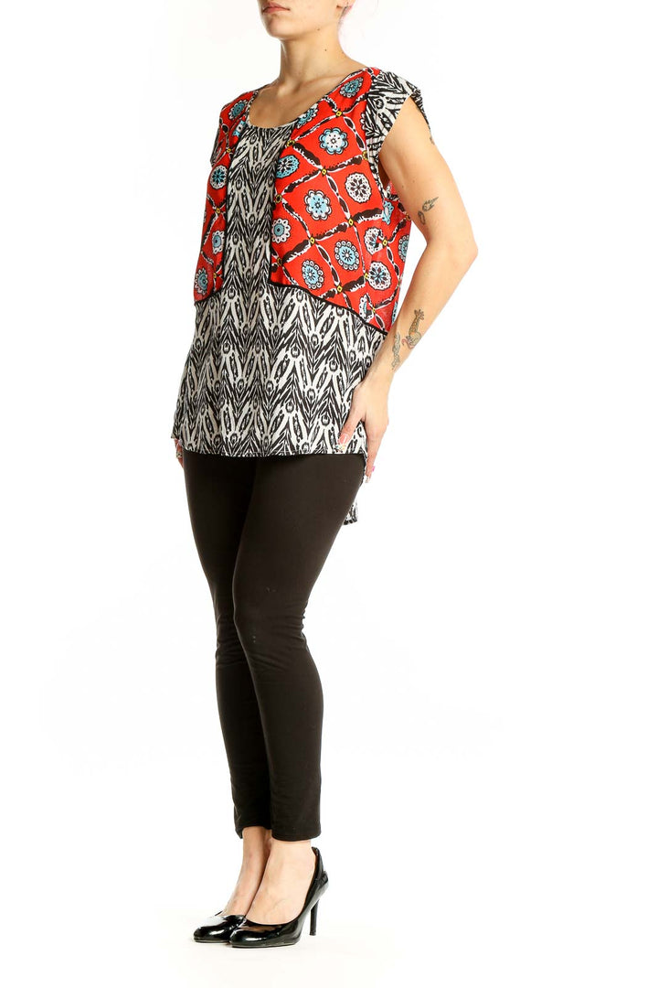 Front view of THML red and black patterned rayon top with floral design