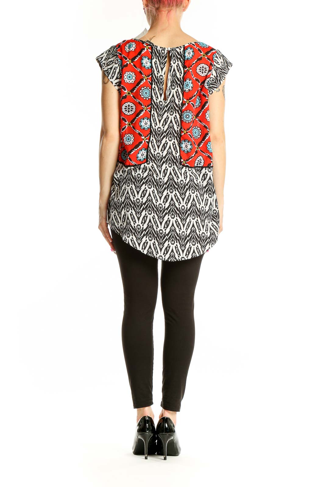Side view of THML red and black patterned rayon top showing full length