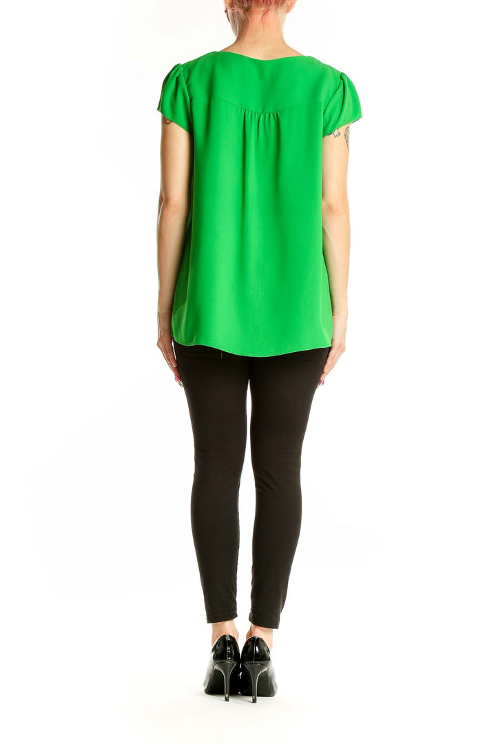 Back view of green V-neck cap sleeve blouse by Skies Are Blue