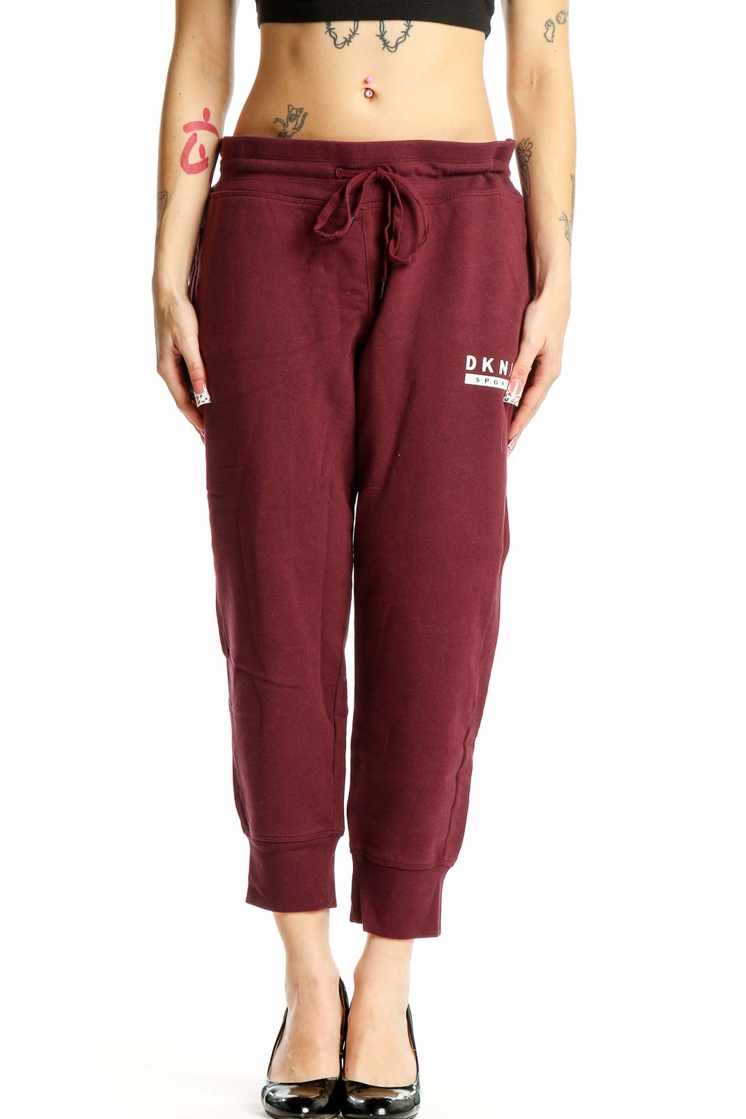 Front view of DKNY Sport burgundy cotton joggers with drawstring waist