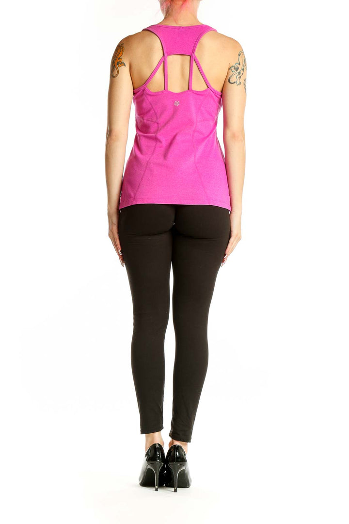 Back view of pink Athleta V-neck athletic tank top on model