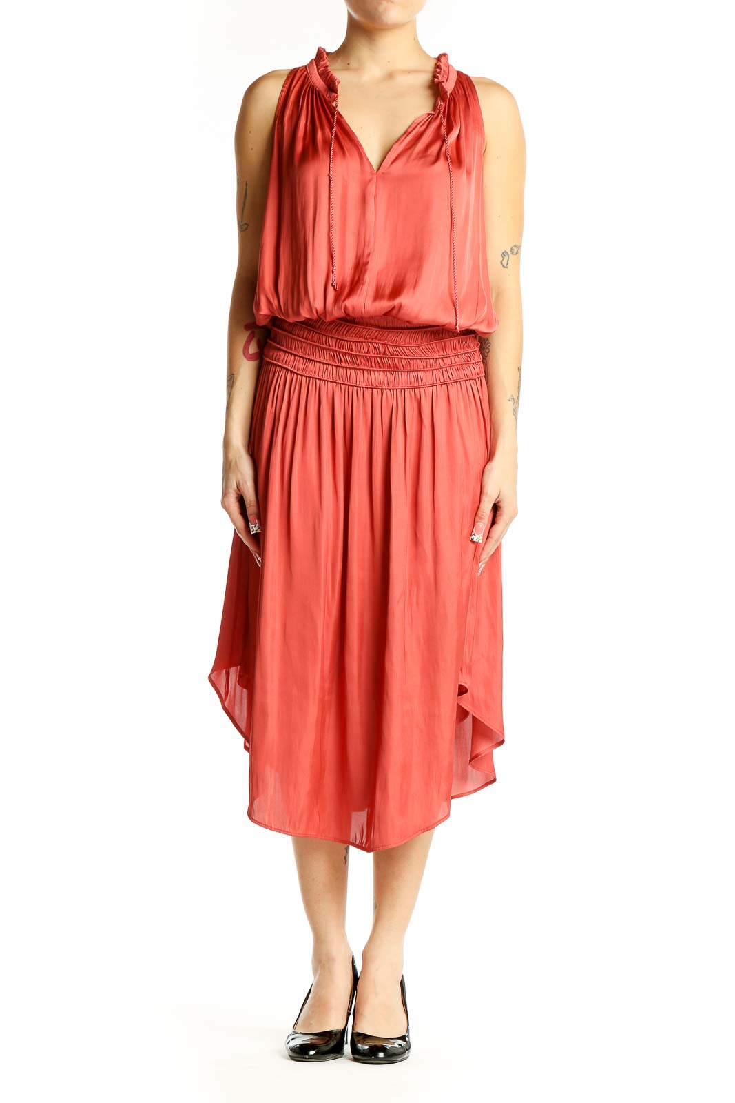 Front view of coral Eva Mendes midi dress with V-neck and ruffle details