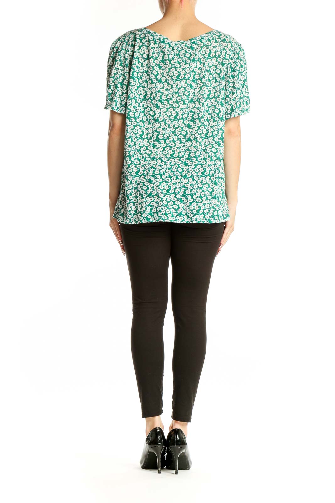 Side view of green floral print cotton top showing relaxed fit