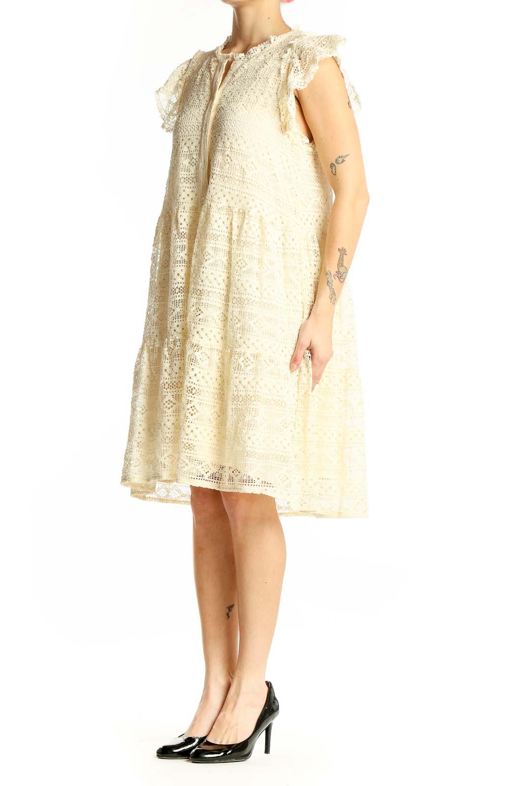 Front view of cream lace tiered midi dress with flutter sleeves
