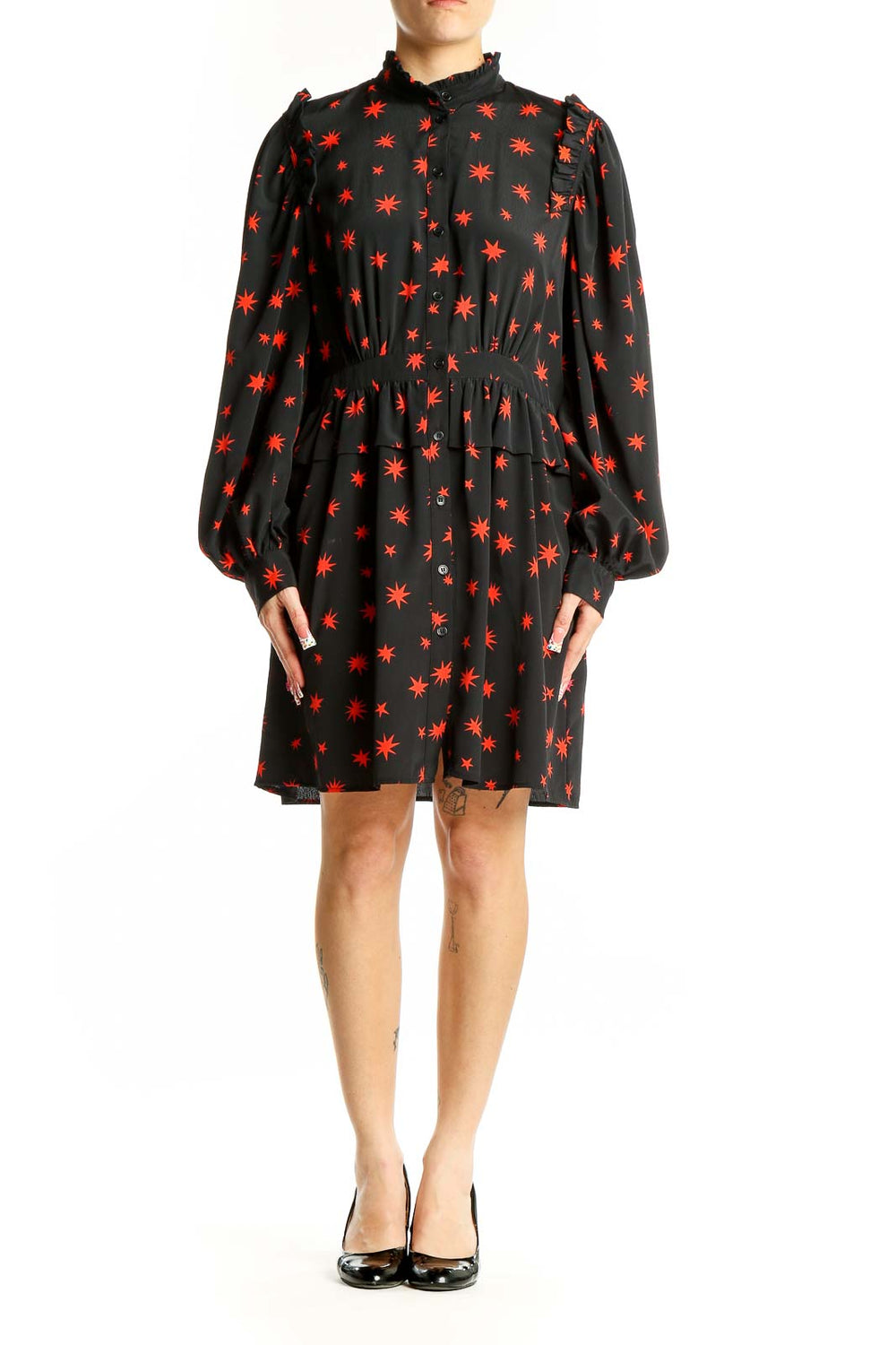 Front view of Topshop black mini dress with red star print and puff sleeves