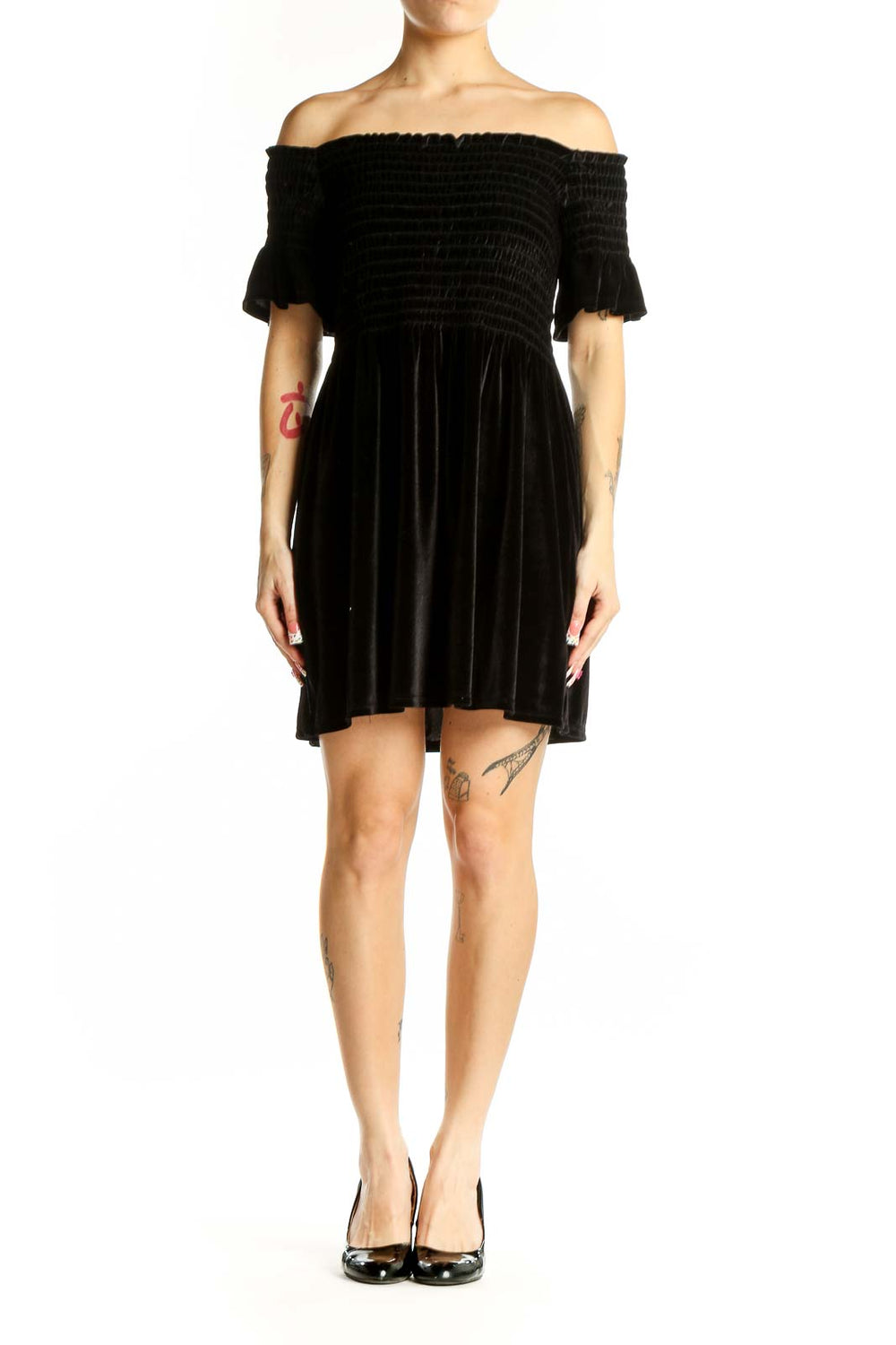 Front view of black velvet off-shoulder mini dress with smocked bodice
