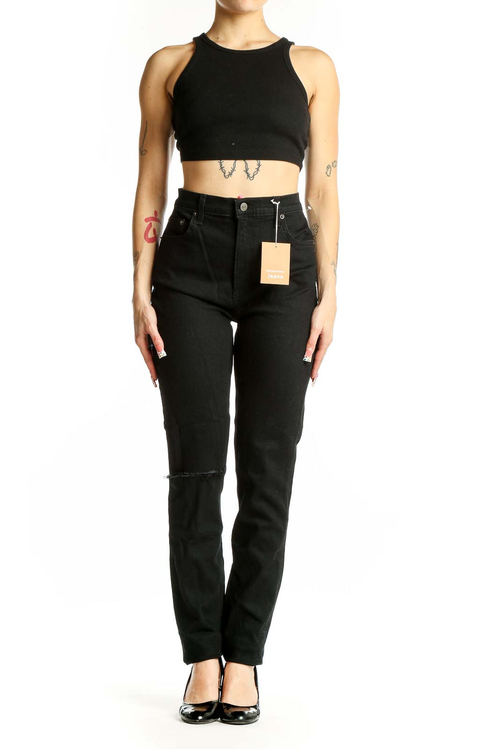 Front view of Reformation black high-waisted straight leg jeans with knee slit
