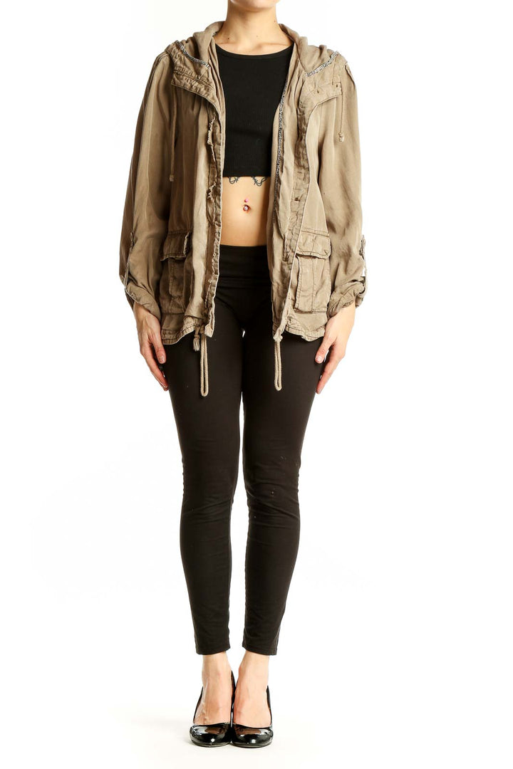 Front view of beige Tencel utility jacket with hood and pockets