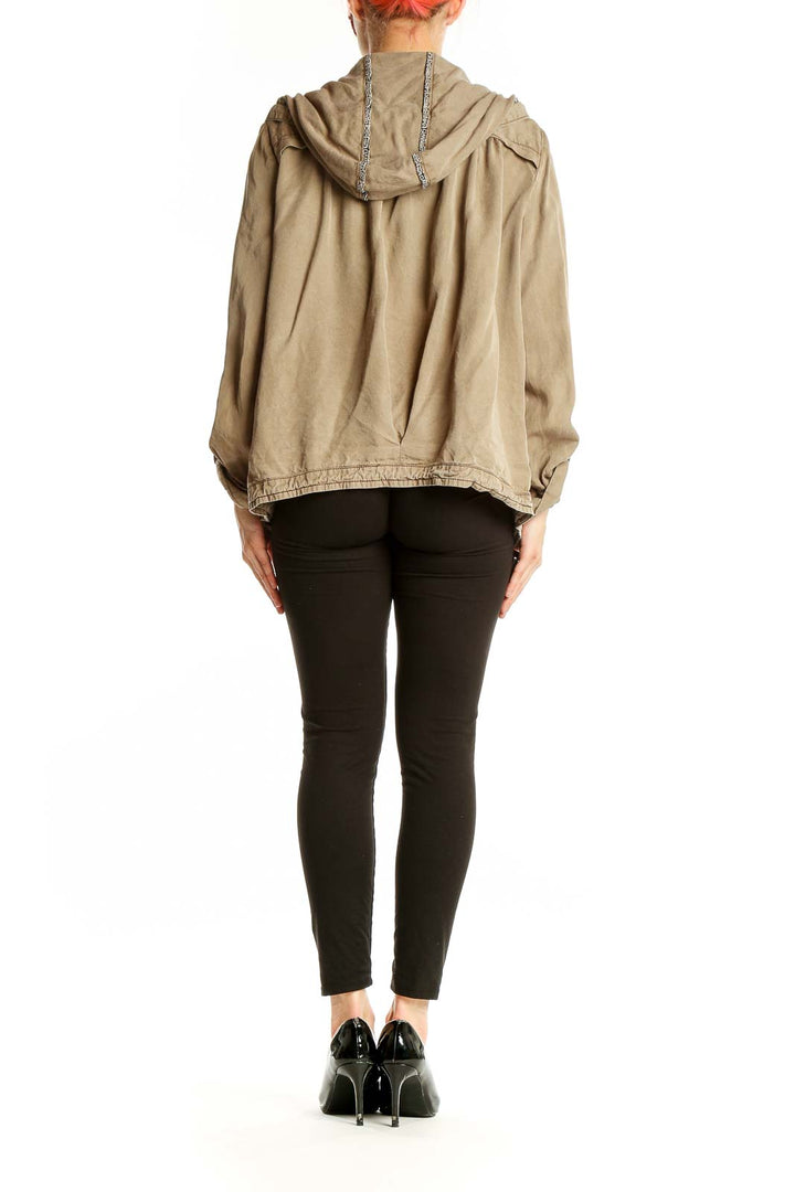 Back view of beige Tencel utility jacket showing relaxed fit