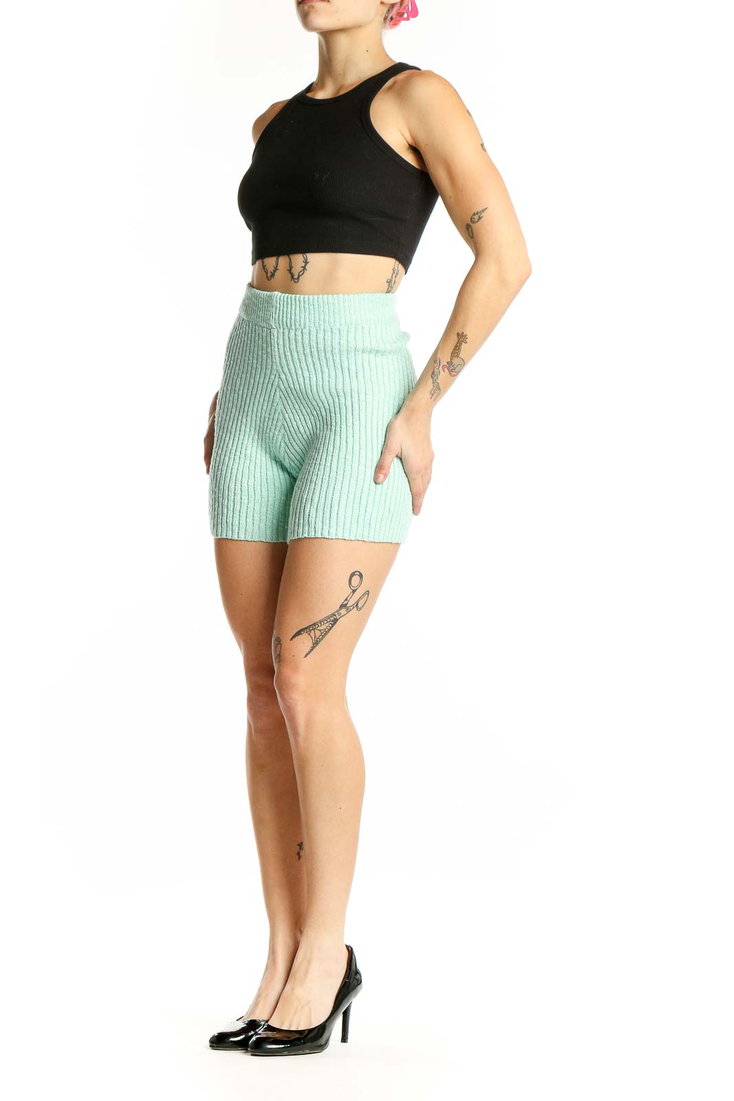 Front view of mint green ribbed knit high-waisted shorts