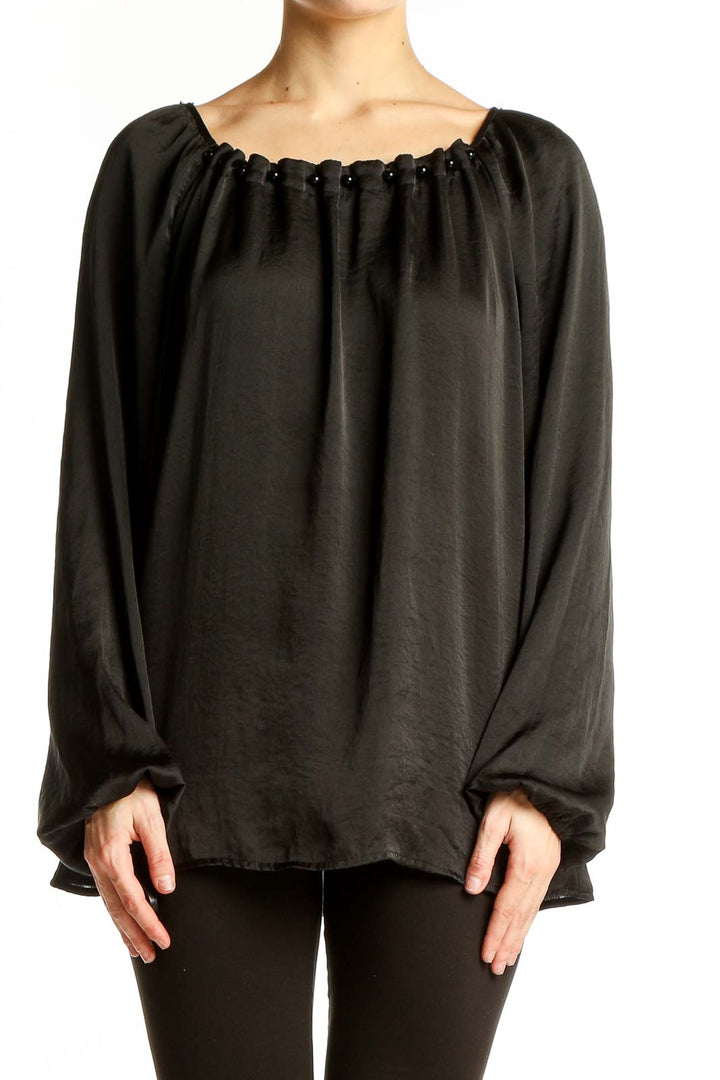 Front view of black flowy peasant blouse with gathered neckline