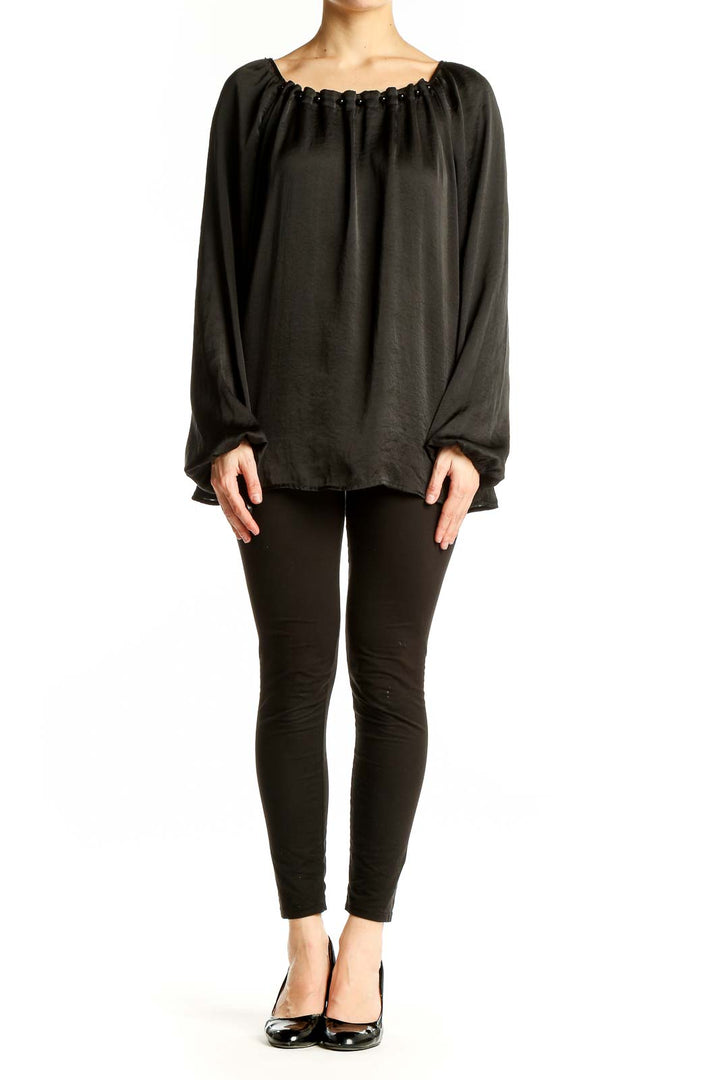 Front view of black flowy peasant blouse with gathered neckline
