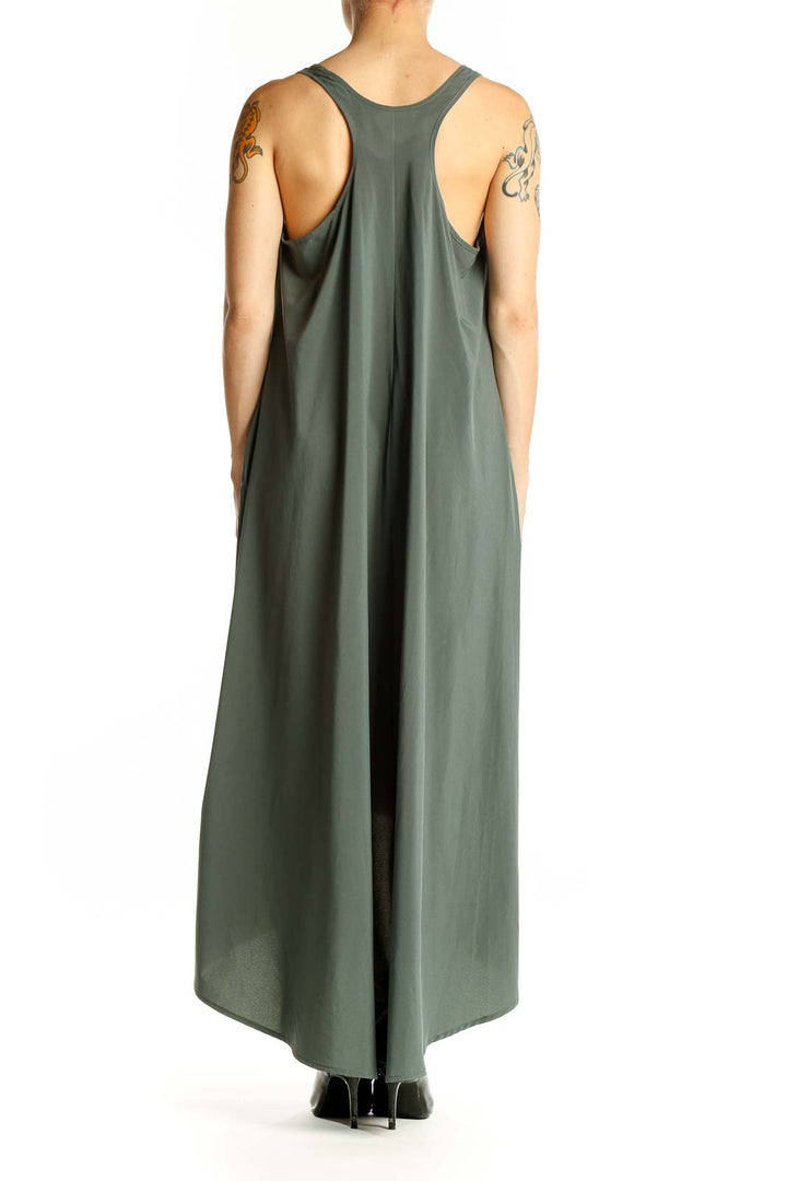 Side view of Athleta olive green high-low maxi dress showing flowy silhouette