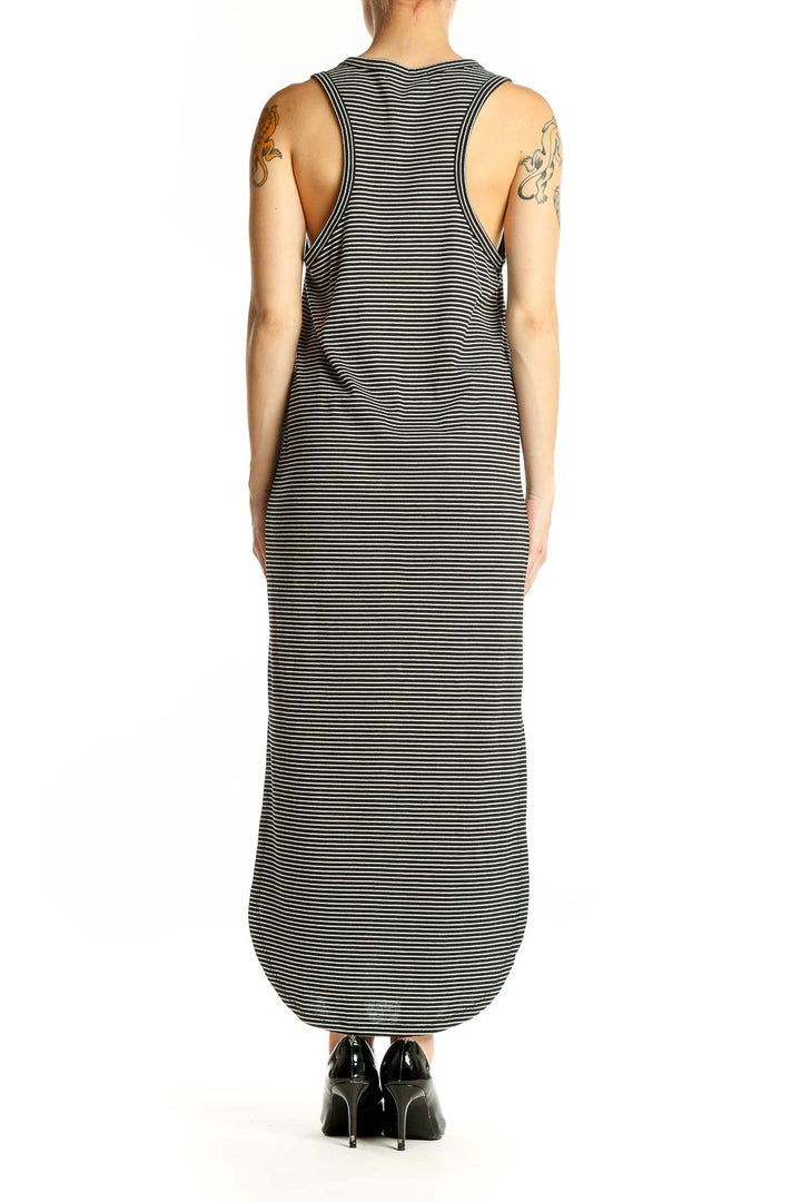 Side view of Black Striped Maxi Tank Dress showing length and fit