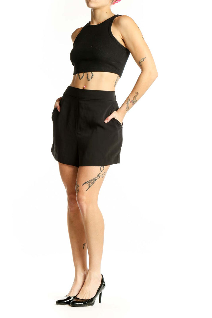 Front view of black high-waisted Calvin Klein shorts