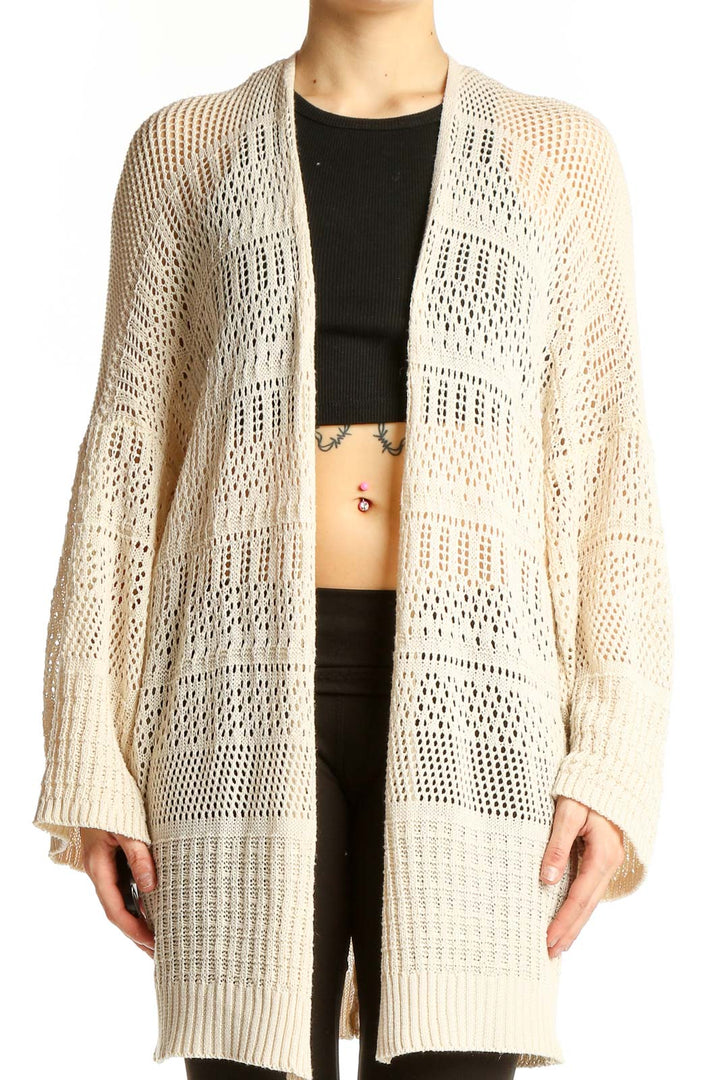 Front view of SilkRoll cream open-knit long cardigan