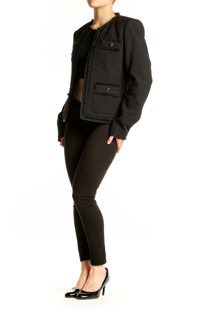 Front view of Karl Lagerfeld Paris black tweed blazer with fringe trim