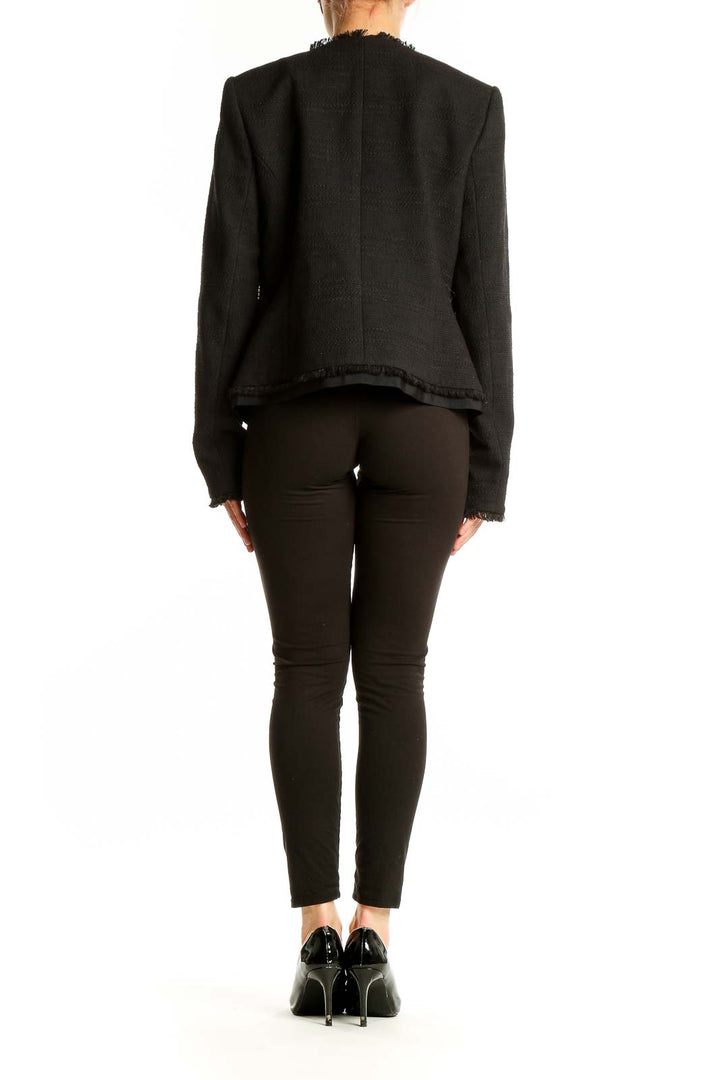 Back view of Karl Lagerfeld Paris black tweed blazer showing tailored fit