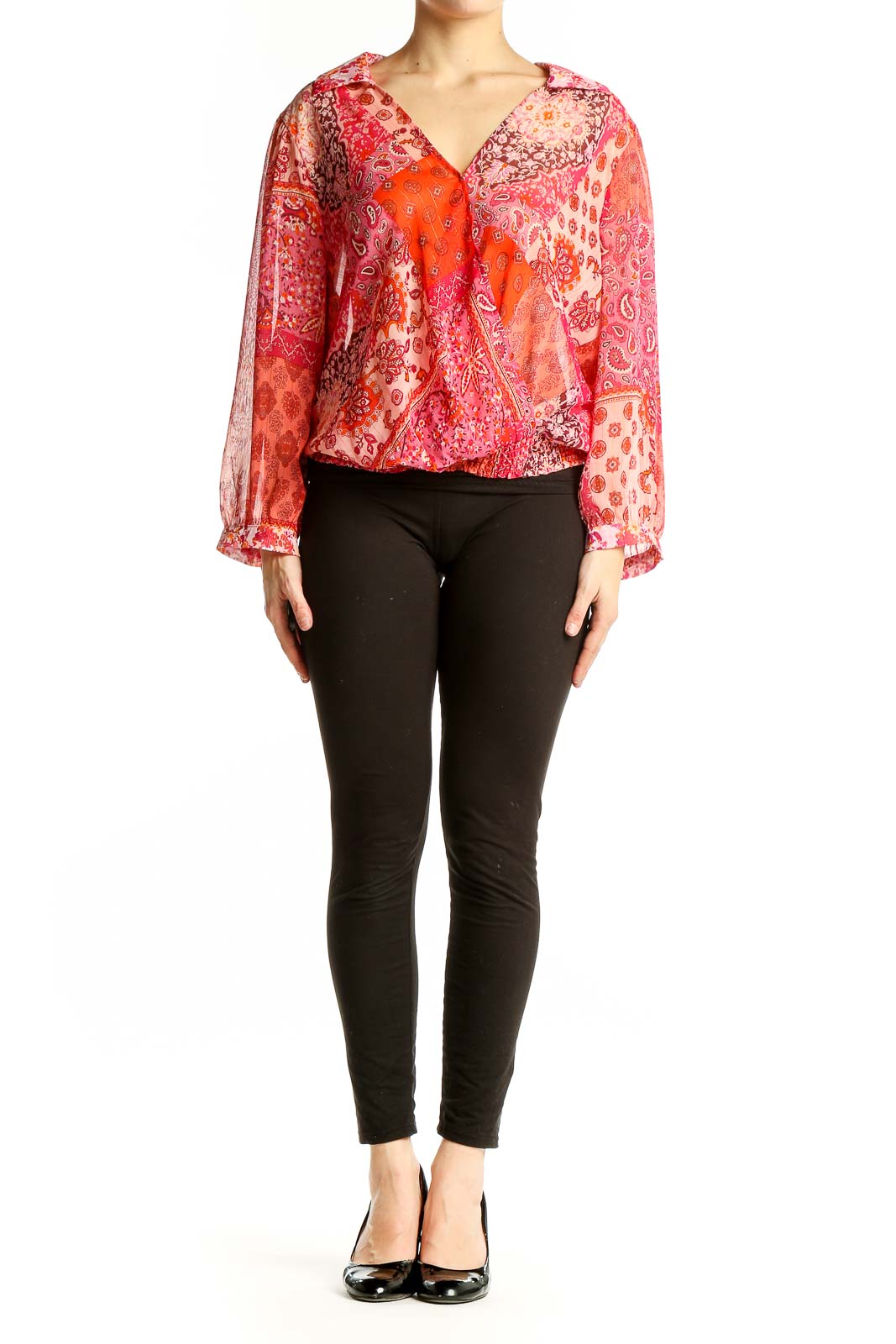 Front view of orange floral paisley wrap blouse with long sleeves