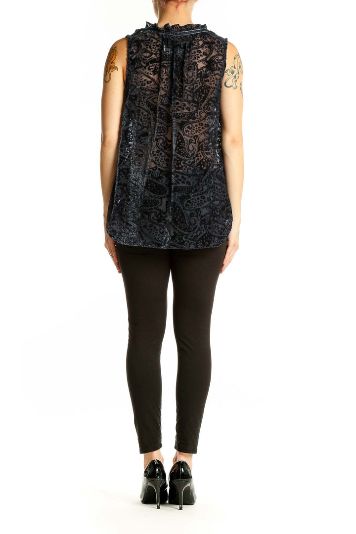 Side view of Black Velvet Burnout Sleeveless Top by Violet & Claire showing flowy fit