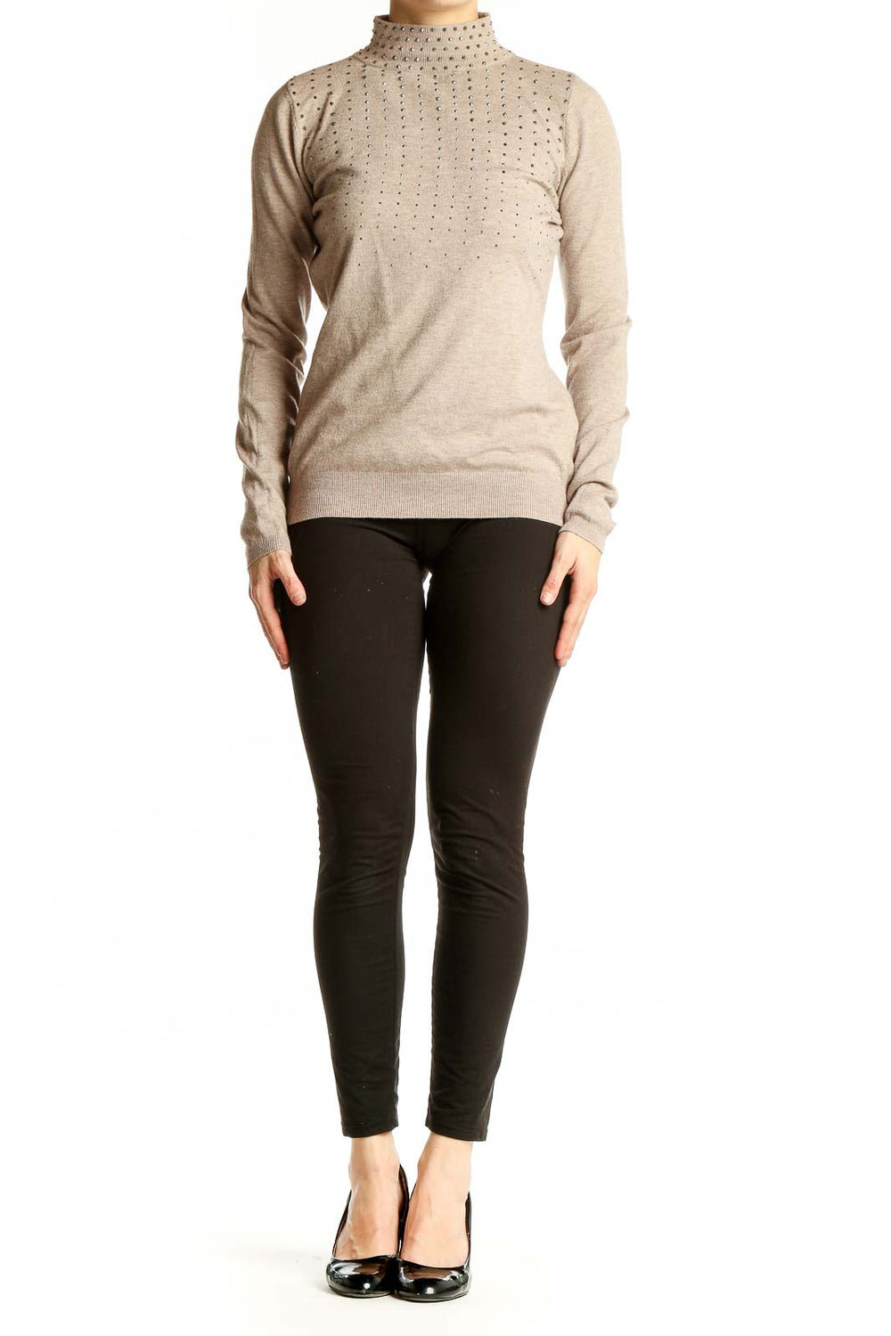 Front view of beige studded turtleneck sweater by Liquid by Sioni