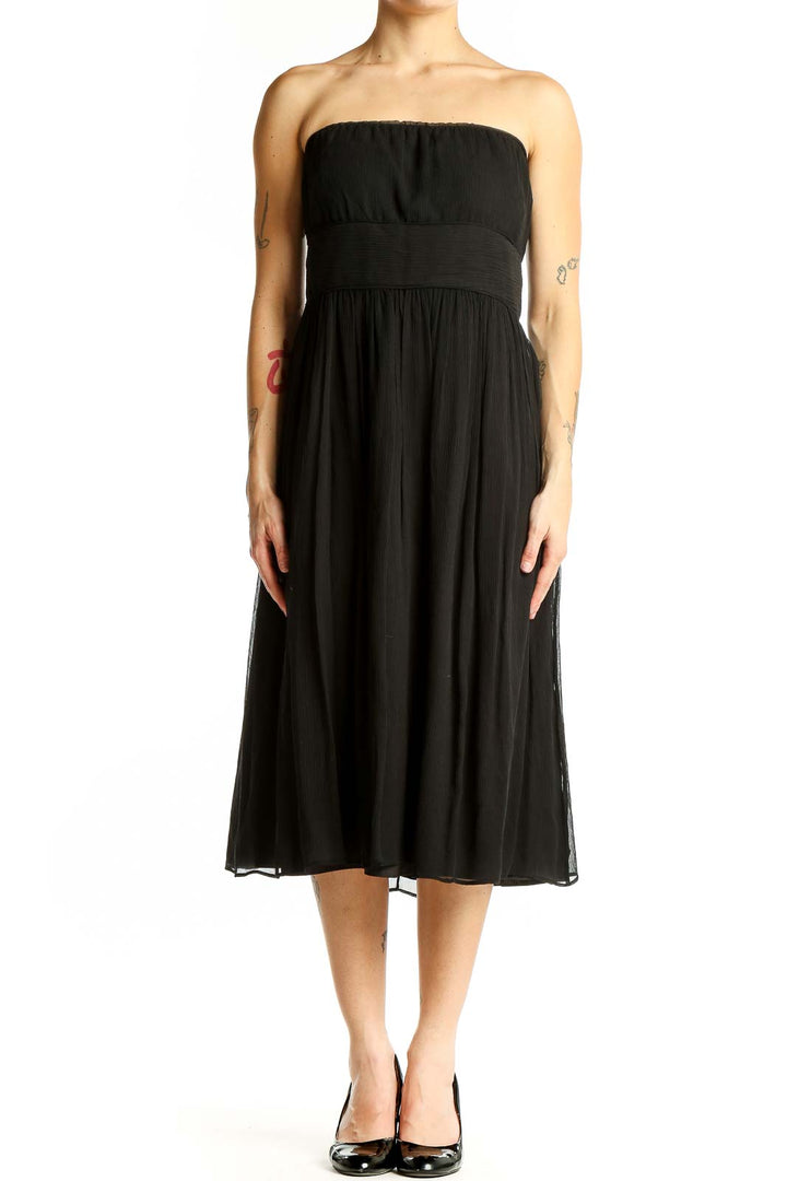 Front view of J.Crew black strapless midi dress with gathered bodice