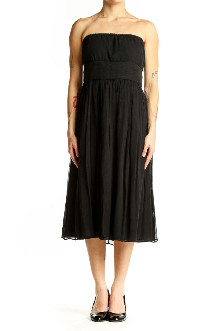 Front view of J.Crew black strapless midi dress with gathered bodice