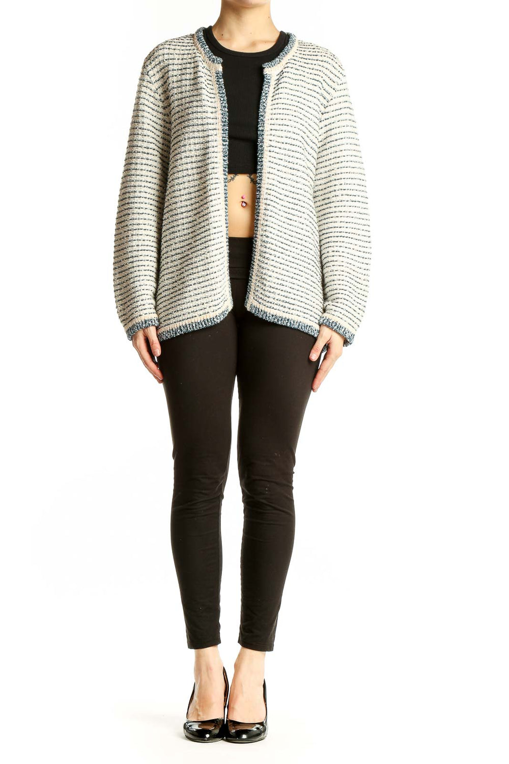 Front view of white striped open front cardigan with blue trim