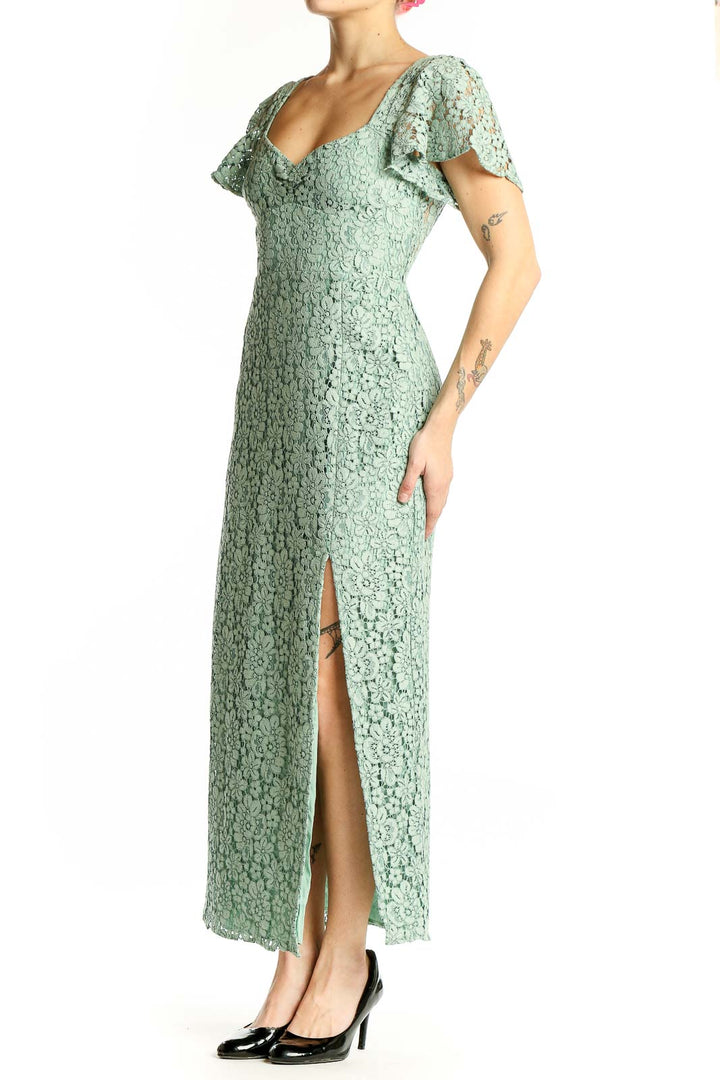 Front view of Zara mint green lace maxi dress with sweetheart neckline
