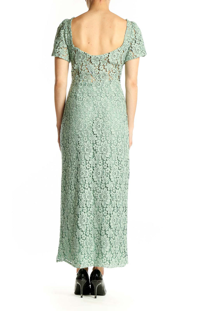 Side view of Zara mint green lace maxi dress showing side slit