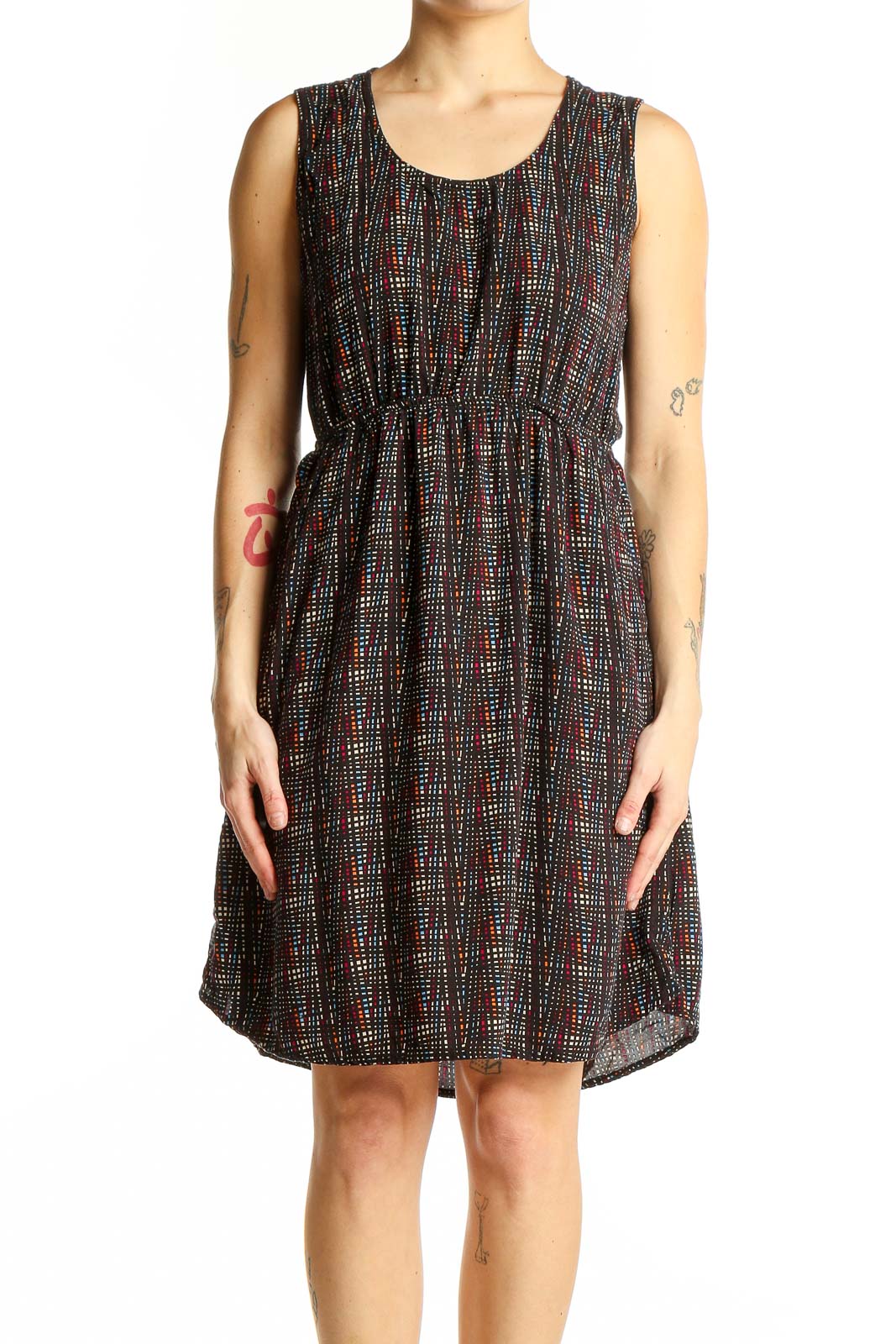 Front view of Kavu black sleeveless dress with colorful dot pattern