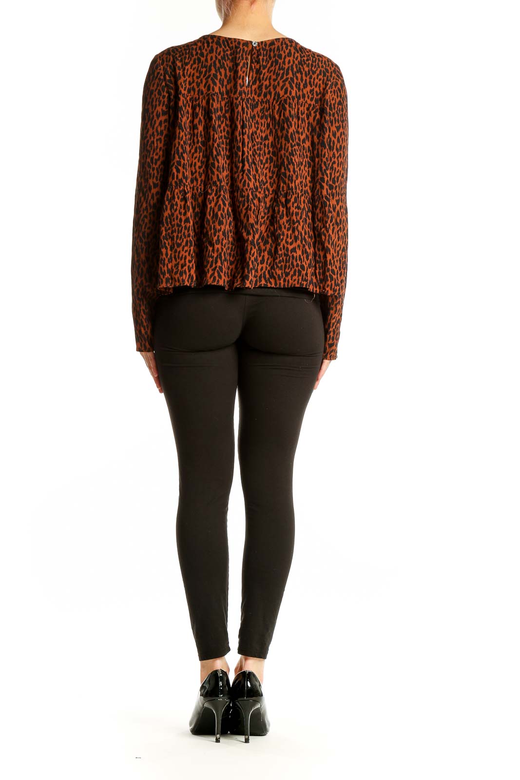 Back view of Gap rust leopard print flowy blouse on model