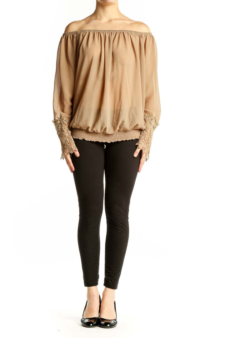Front view of beige Umgee off-shoulder blouse with lace cuffs