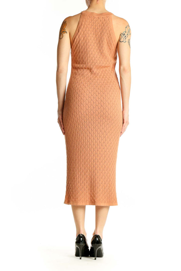 Back view of peach textured knit midi dress by House of Harlow 1960