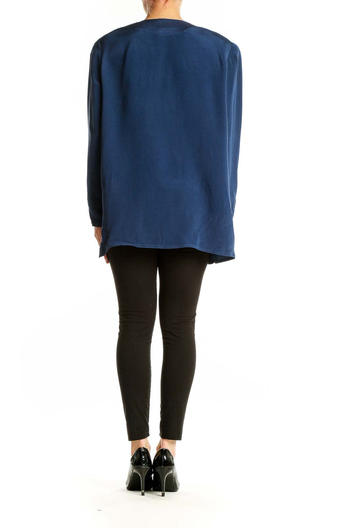 Side view of Adrianna Papell navy silk button-front jacket on model