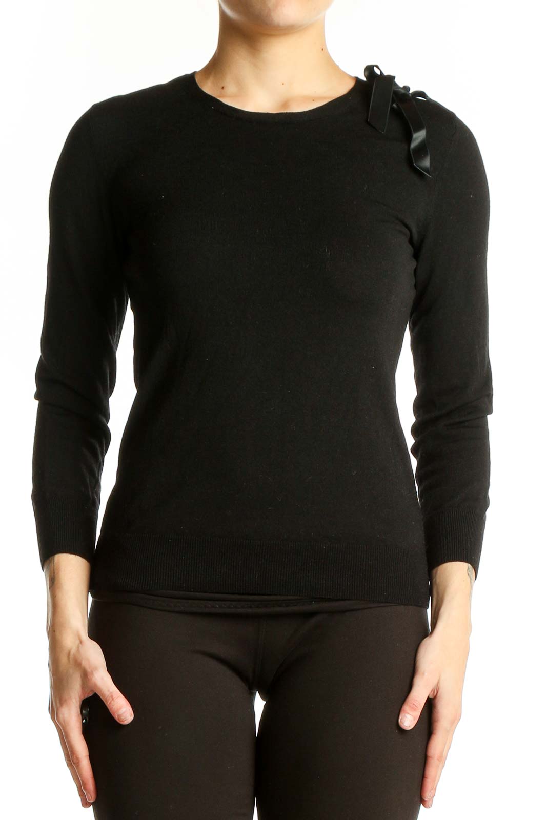 Front view of black Theory sweater with ribbon shoulder detail
