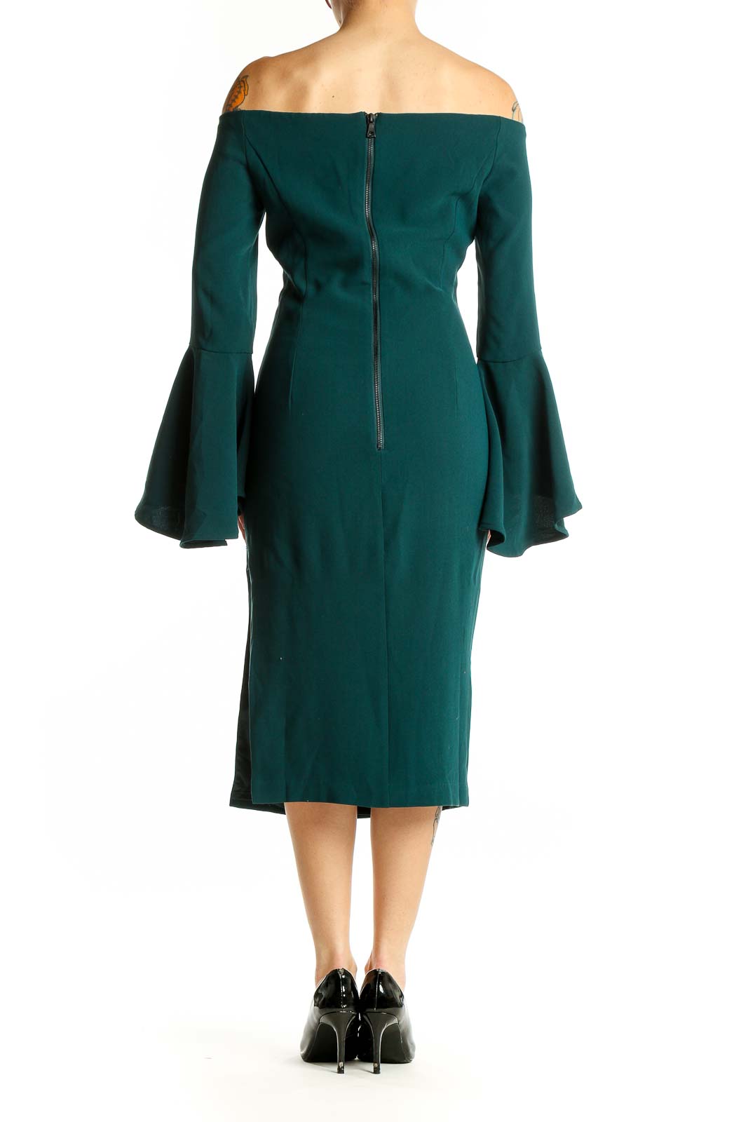 Side view of emerald green off-shoulder midi dress showing side slit